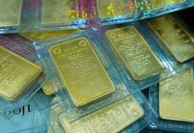 Giá vàng và USD đồng loạt tăng mạnh