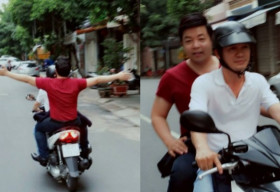 Quang Lê bị ném đá vì “khoe” không đội mũ bảo hiểm