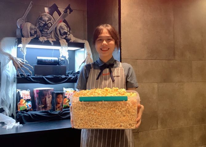 Popcorn Beast 5 Lotte Cinema miễn phí bắp cho khách mang vật đựng đến rạp