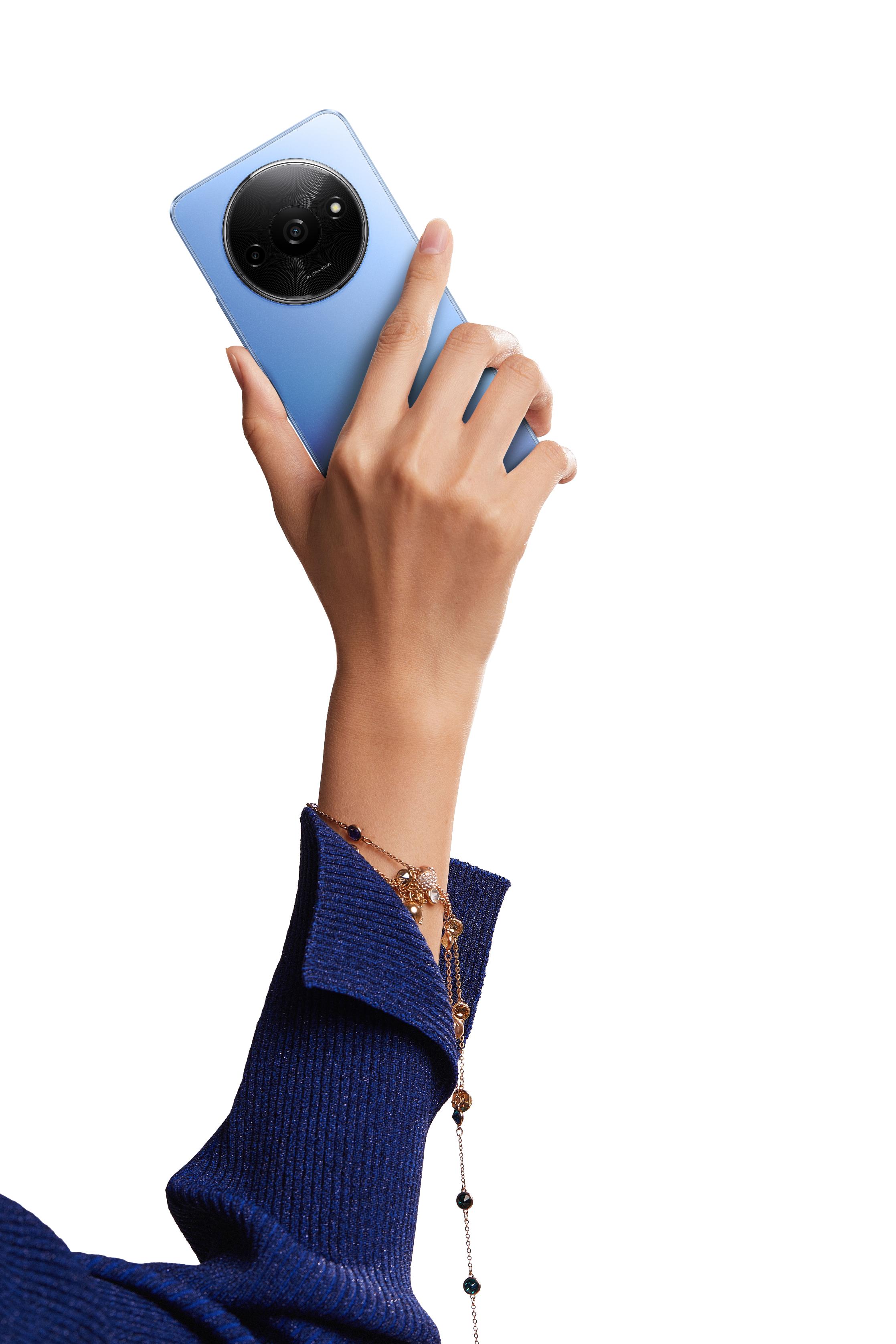 Redmi A3 blue handheld Xiaomi ra mắt Redmi A3: Màn hình lớn, thiết kế đậm chất thời trang, giá chỉ từ 2,49 triệu đồng